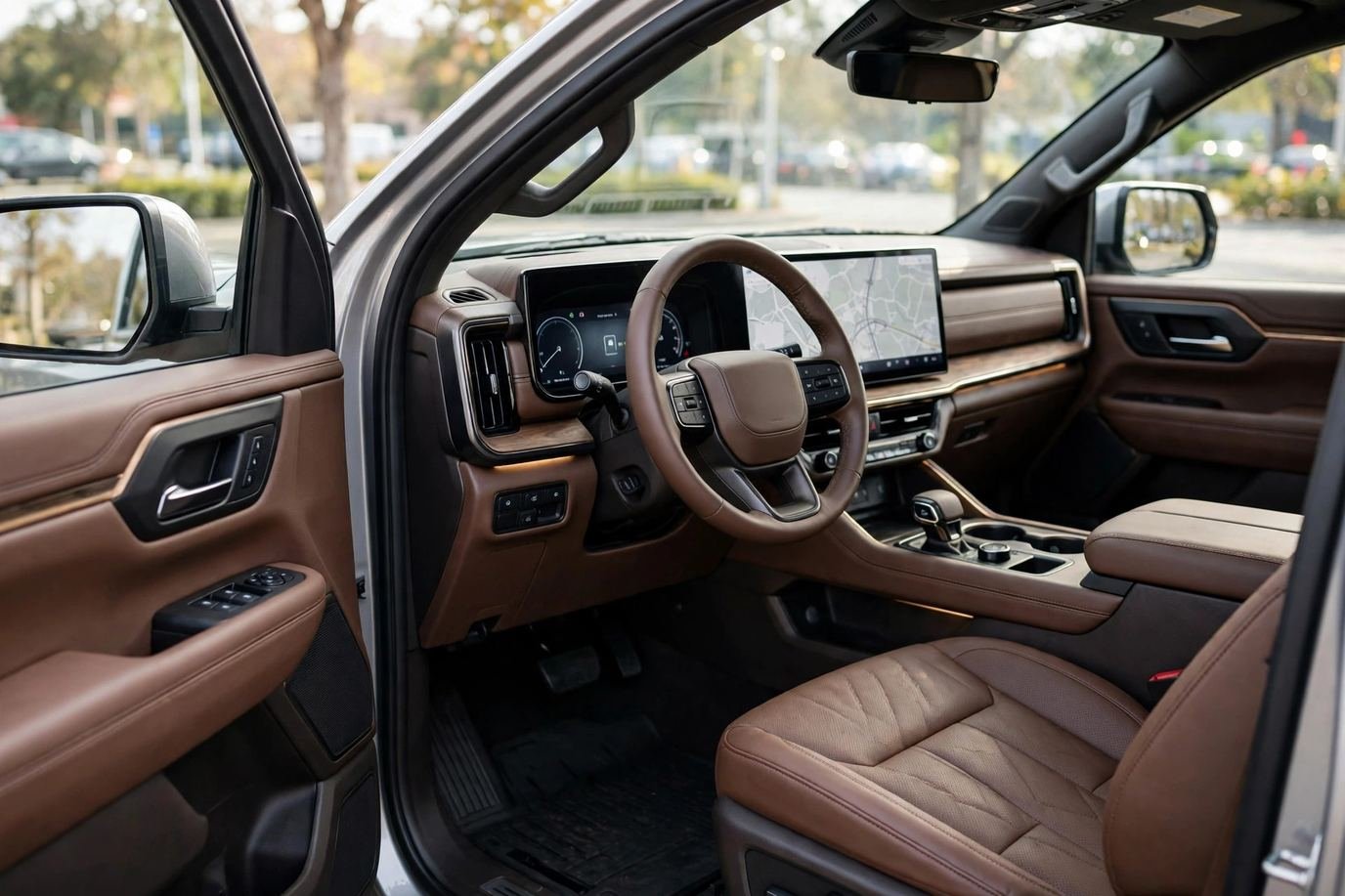 The spacious Ram 1500 interior with a large touchscreen and leather seats.